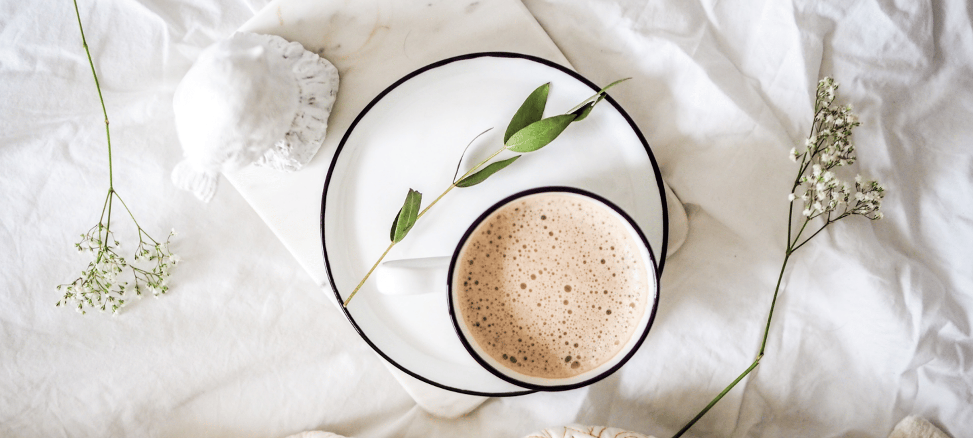 a close up of a black and brown abstract painting